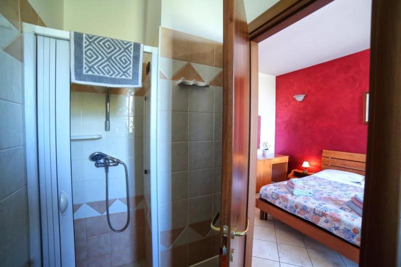 A bed or beds in a room at Maxpensione