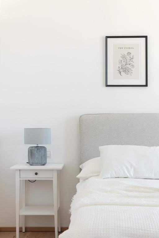 Postel nebo postele na pokoji v ubytování Sophienne Apartments