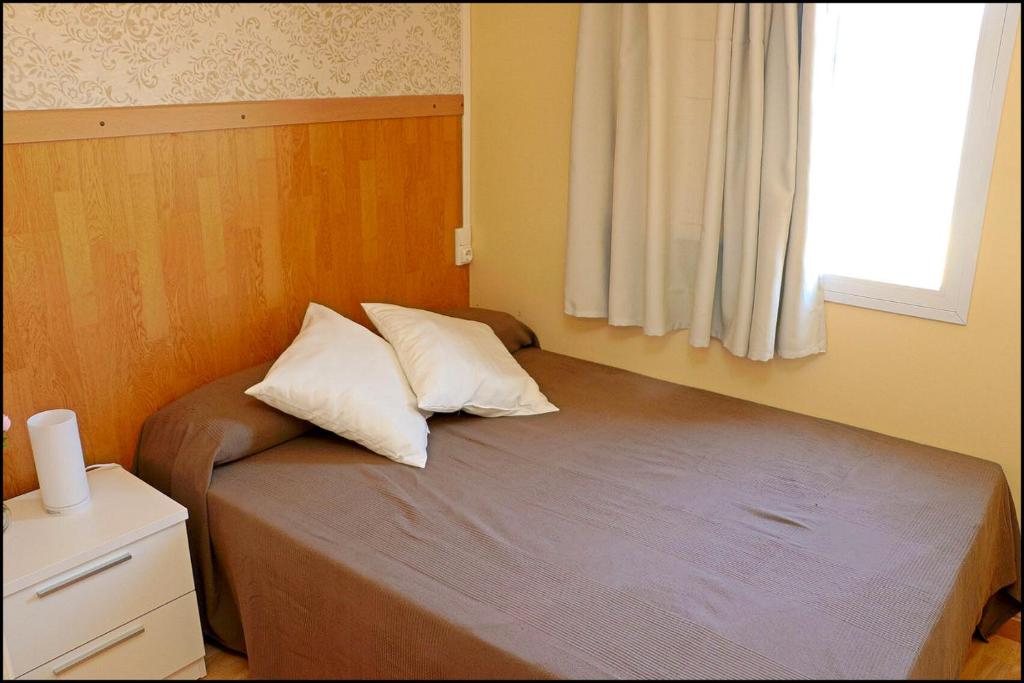 Posteľ alebo postele v izbe v ubytovaní Bungalow con piscina privada