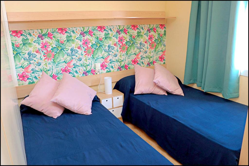 Posteľ alebo postele v izbe v ubytovaní Bungalow con piscina privada
