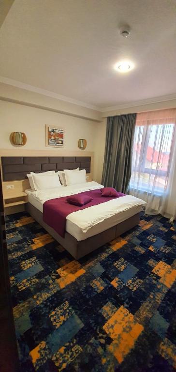 Postel nebo postele na pokoji v ubytování Hotel Yarus Plus