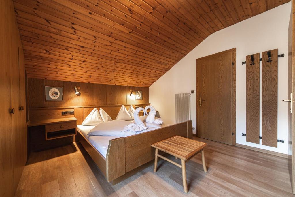 Postel nebo postele na pokoji v ubytování Hotel Fines