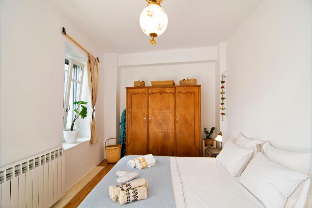 Postel nebo postele na pokoji v ubytování Quartano Paros Residence