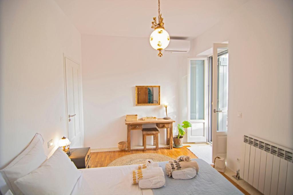Posteľ alebo postele v izbe v ubytovaní Quartano Paros Residence