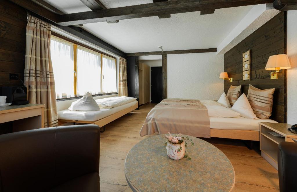 Postel nebo postele na pokoji v ubytování Relais Bayard