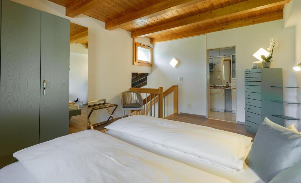 Postel nebo postele na pokoji v ubytování Relais Bayard