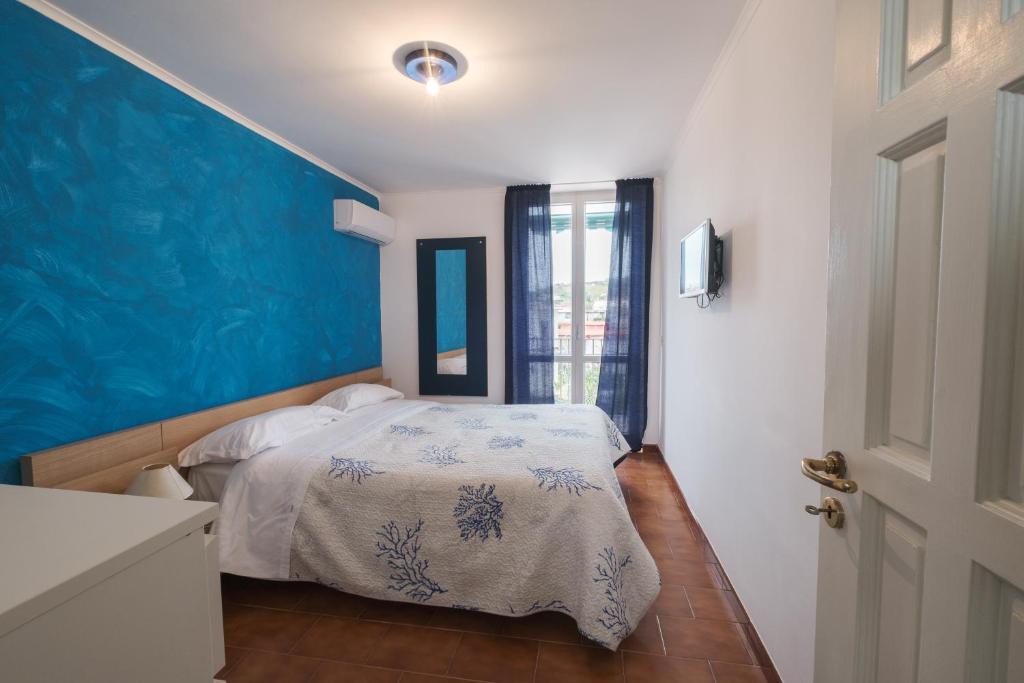 Postel nebo postele na pokoji v ubytování Borgo Blu