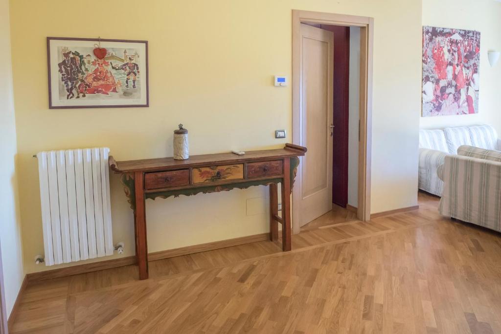 A bed or beds in a room at S034 - Sirolo, quadrilocale in centro arredato con gusto