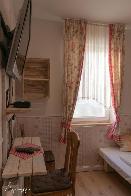 Postel nebo postele na pokoji v ubytování Agroturystyka Nad Jeziorem-Osada Indiańska