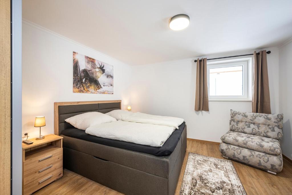 Postel nebo postele na pokoji v ubytování Ferienwohnung Weiß