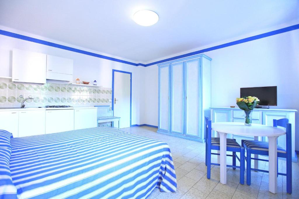 TV a/nebo společenská místnost v ubytování TH Ortano - Ortano Mare Residence