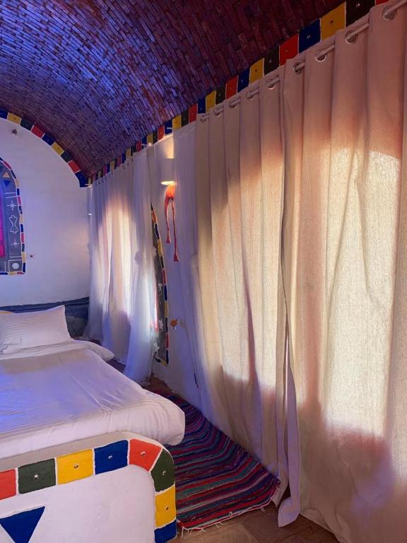 Postel nebo postele na pokoji v ubytování Anakato Nubian Experience