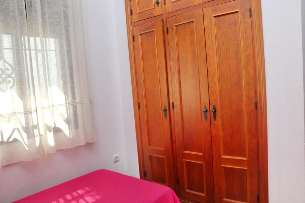 Postel nebo postele na pokoji v ubytování Chalet Chaparrillo Conil