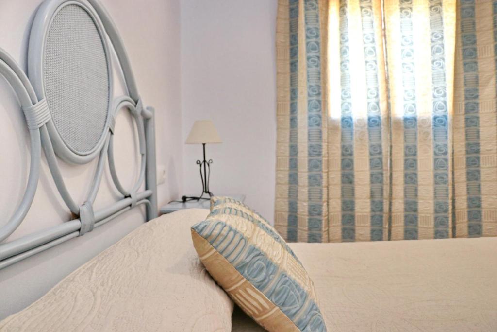 Postel nebo postele na pokoji v ubytování Chalet Chaparrillo Conil