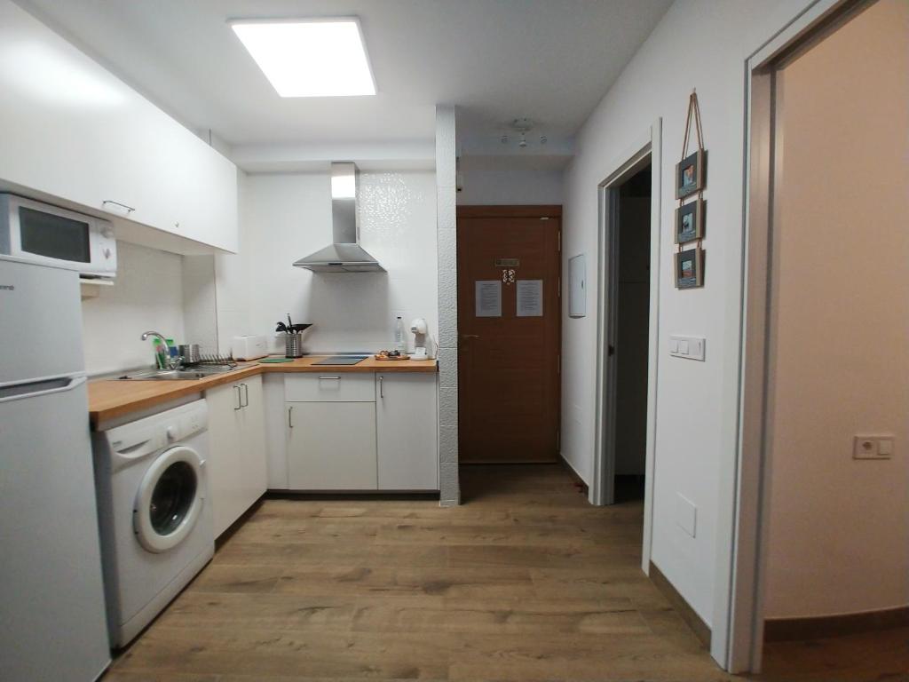 Kuchyňa alebo kuchynka v ubytovaní mi apartamento 60