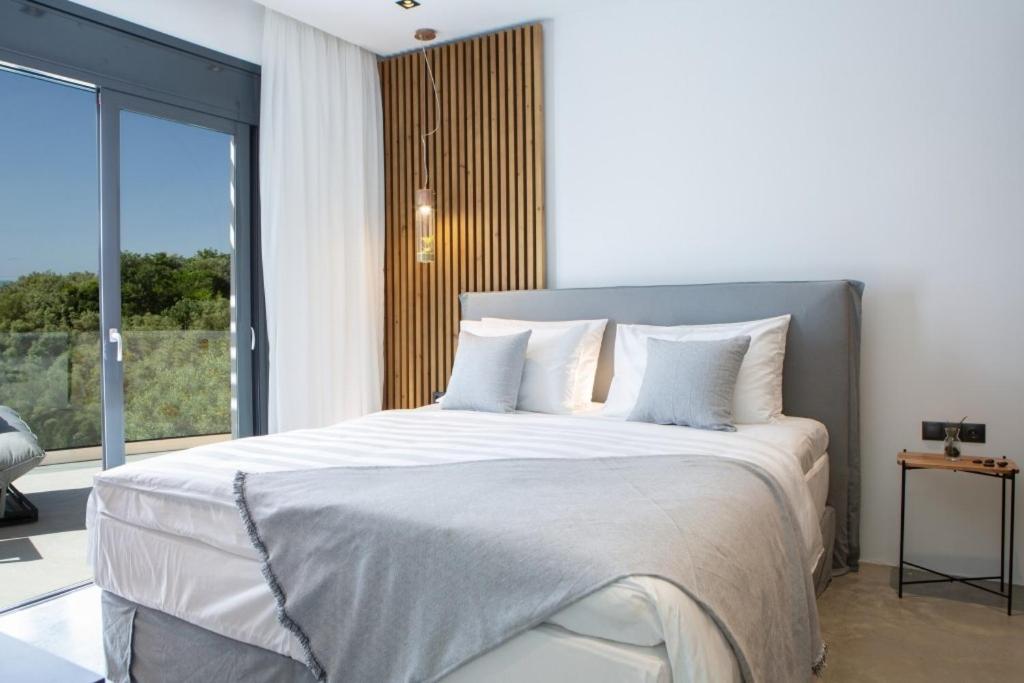 Posteľ alebo postele v izbe v ubytovaní High-end Villa Faos "One"