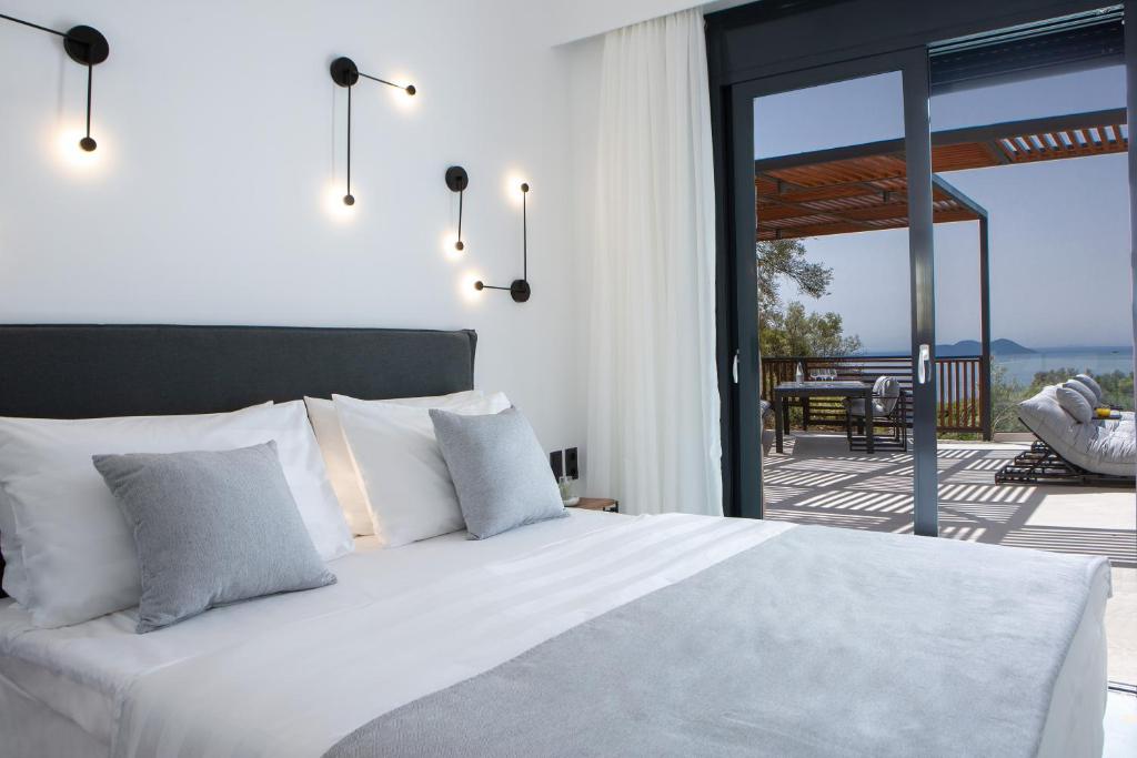 Posteľ alebo postele v izbe v ubytovaní High-end Villa Faos "One"