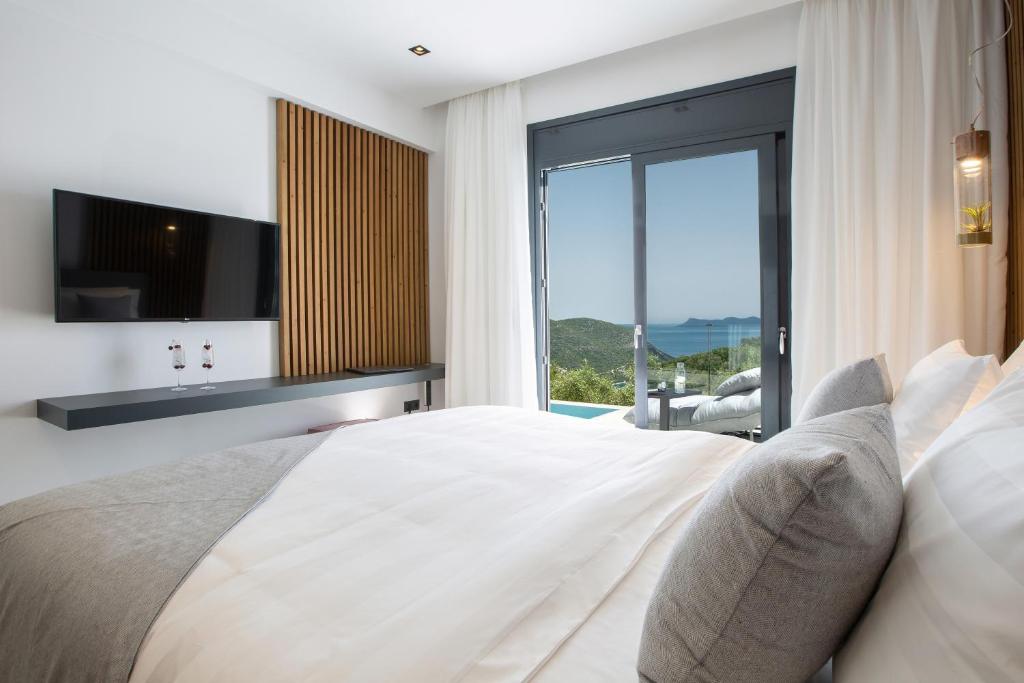 Posteľ alebo postele v izbe v ubytovaní High-end Villa Faos "One"