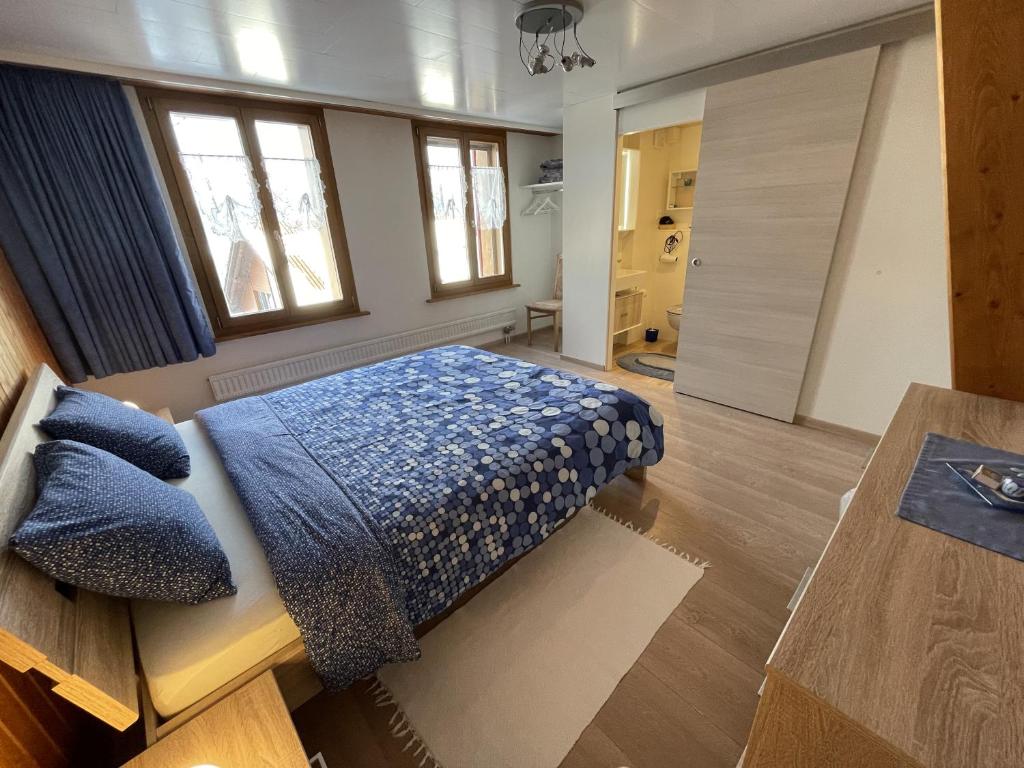 Postel nebo postele na pokoji v ubytování Hälmli