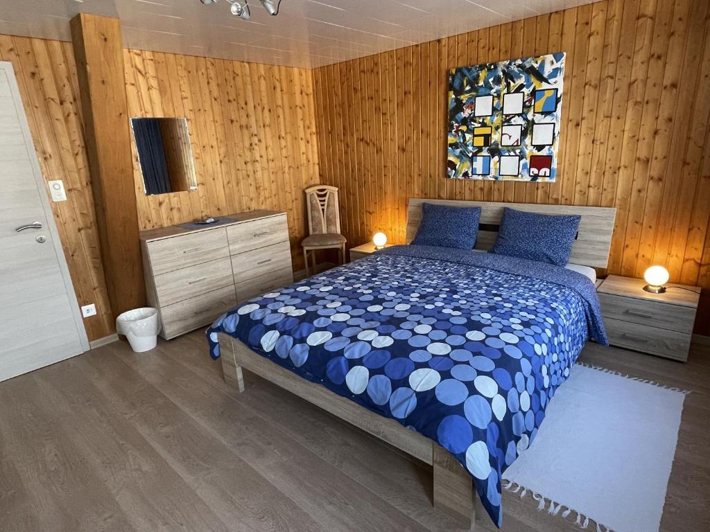 Postel nebo postele na pokoji v ubytování Hälmli