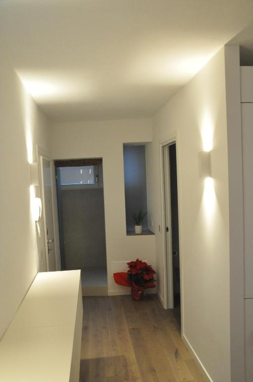 Posteľ alebo postele v izbe v ubytovaní Modena Charme Belle Arti