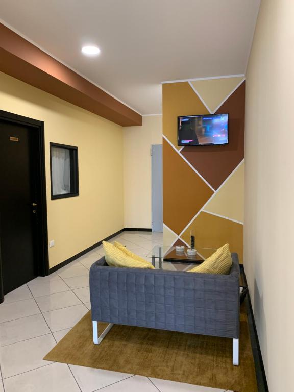 TV a/nebo společenská místnost v ubytování Hotel Bussana