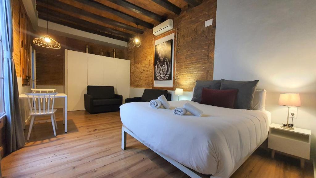 Posteľ alebo postele v izbe v ubytovaní Barrio Gotico Apartments Ferran