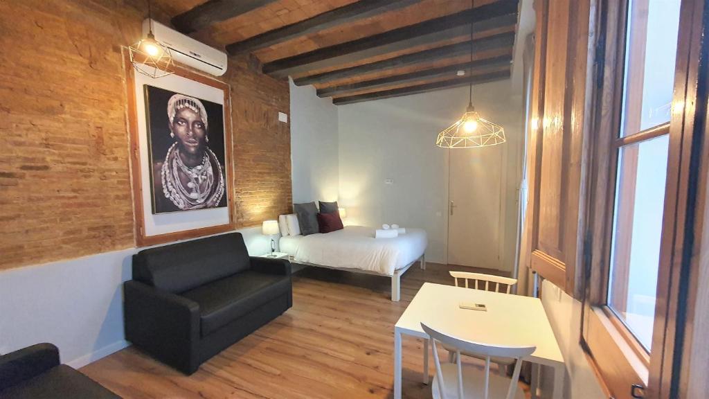 Posteľ alebo postele v izbe v ubytovaní Barrio Gotico Apartments Ferran