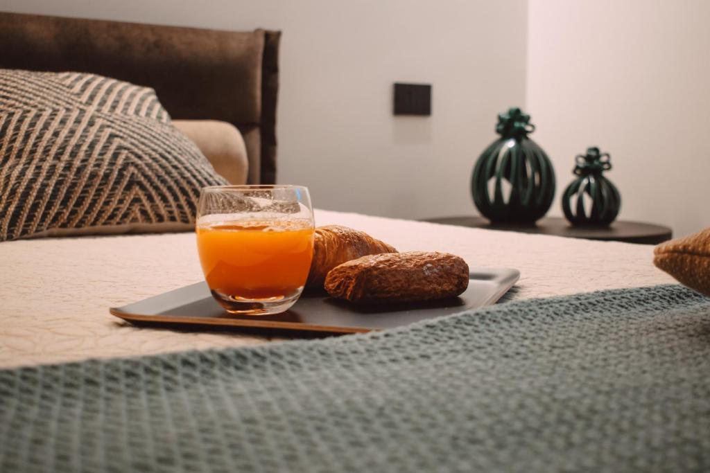 A bed or beds in a room at Viale dei Lecci - Luxury rooms