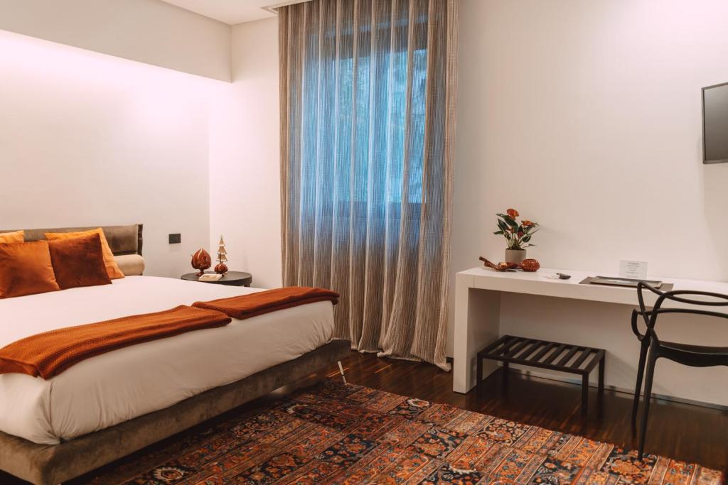 A bed or beds in a room at Viale dei Lecci - Luxury rooms