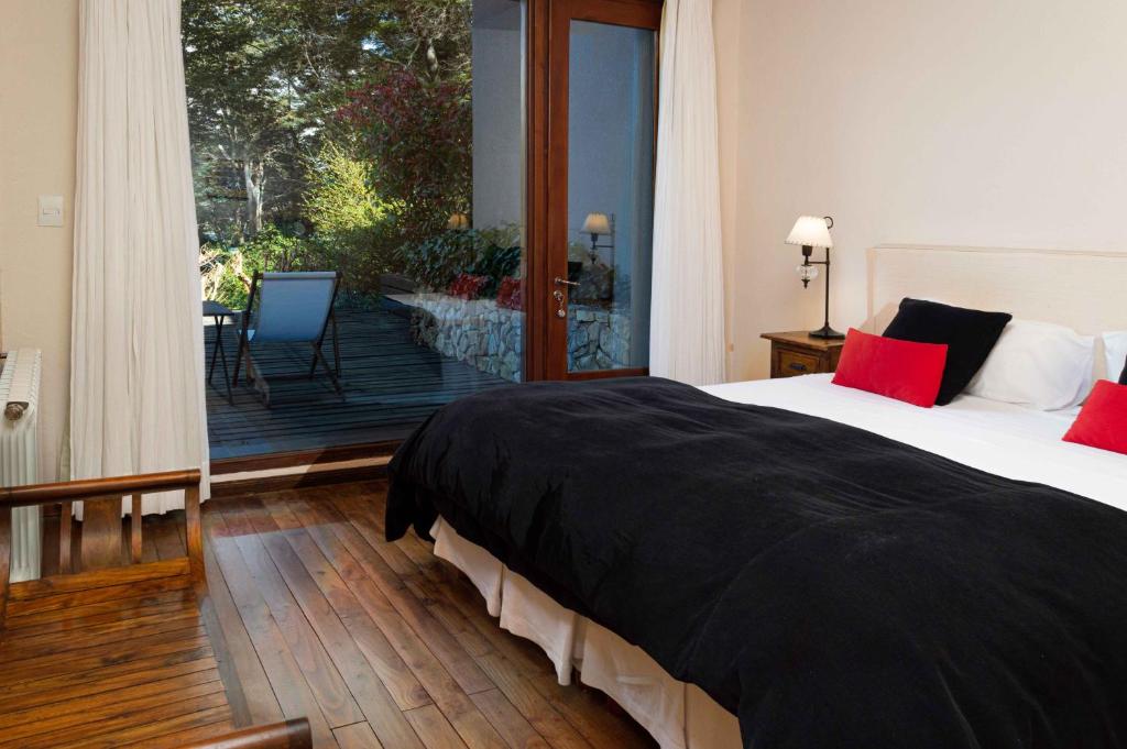 Postel nebo postele na pokoji v ubytování Aldebaran Hotel & Spa