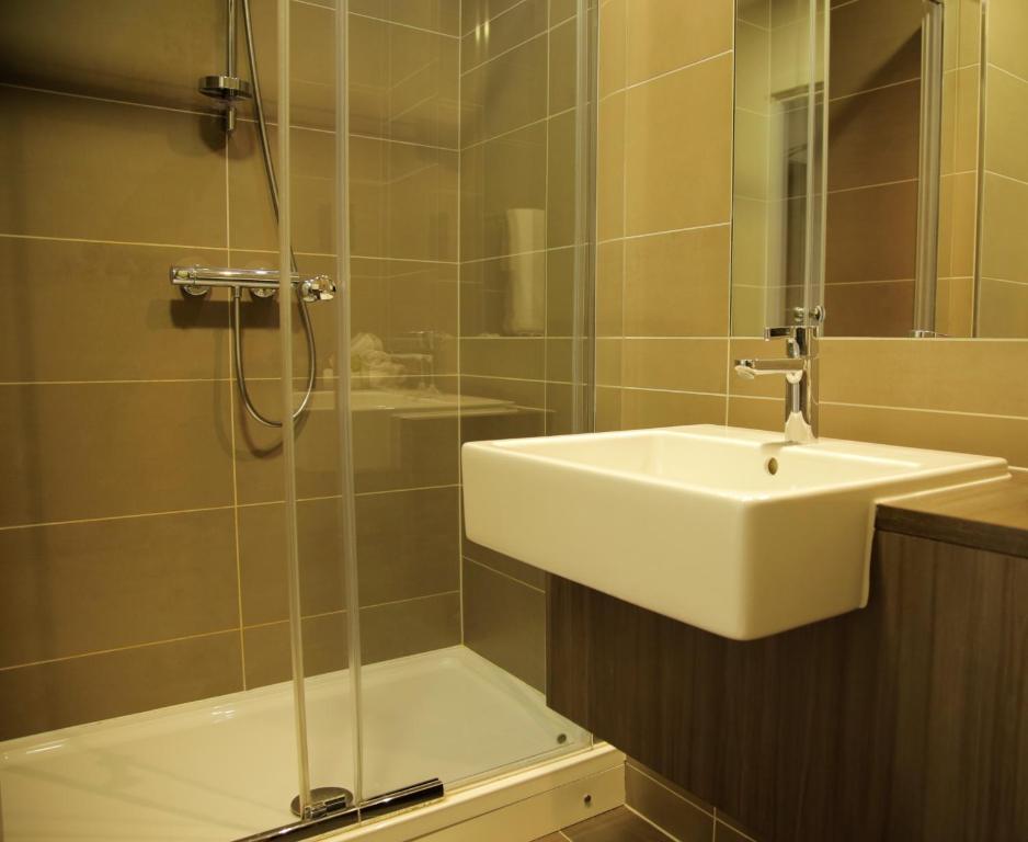 Koupelna v ubytování Hotel Xanadu