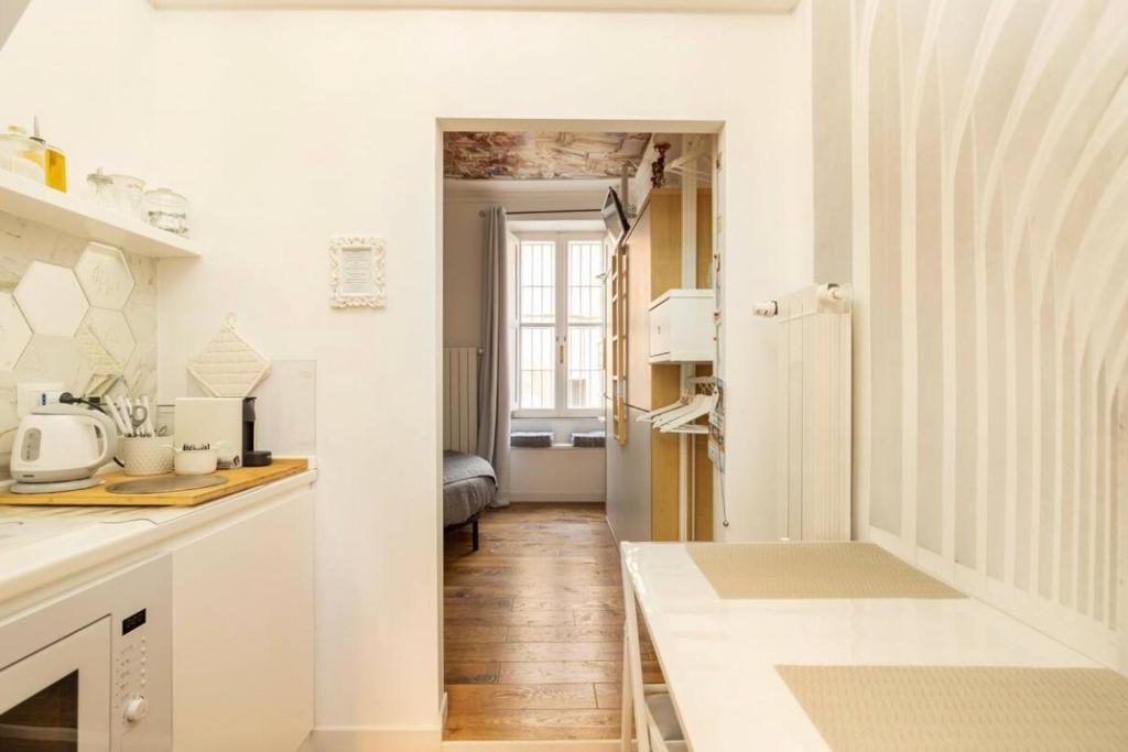 A bed or beds in a room at Carolina’SNest in Trastevere
