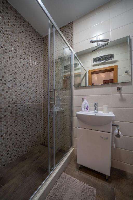 Koupelna v ubytování Aneta Apartments