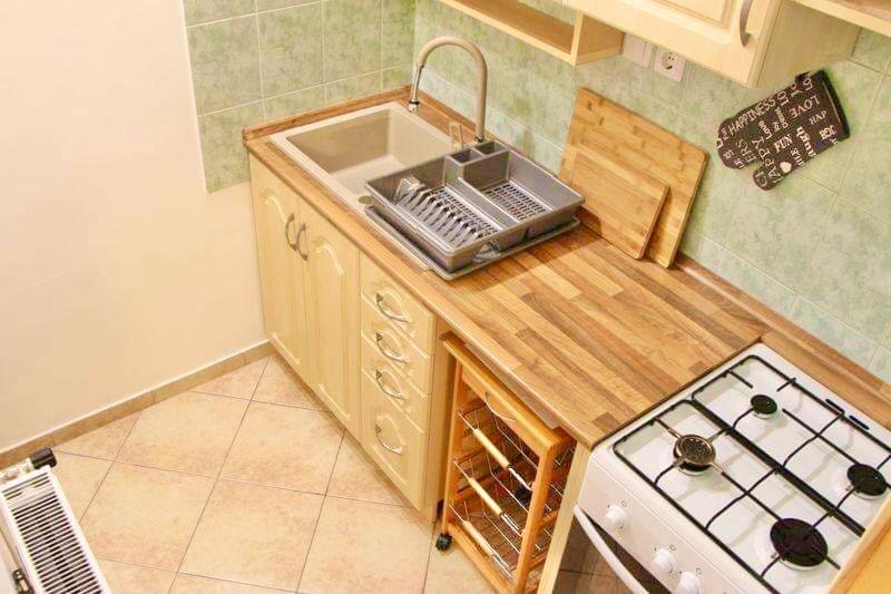 Kuchyň nebo kuchyňský kout v ubytování Relax Wellness Apartman