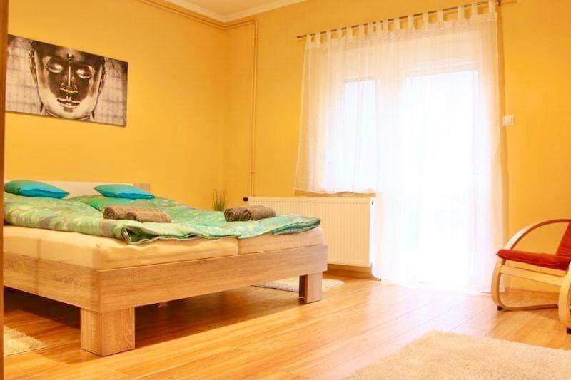 Postel nebo postele na pokoji v ubytování Relax Wellness Apartman