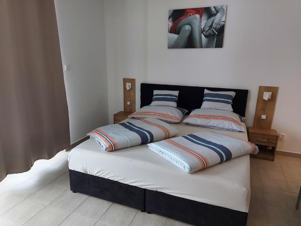 Postel nebo postele na pokoji v ubytování Apartmán Lipno s výhledem na jezero