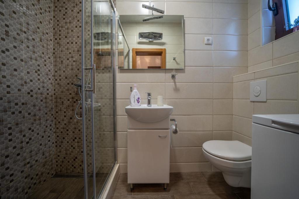 Koupelna v ubytování Aneta Apartments
