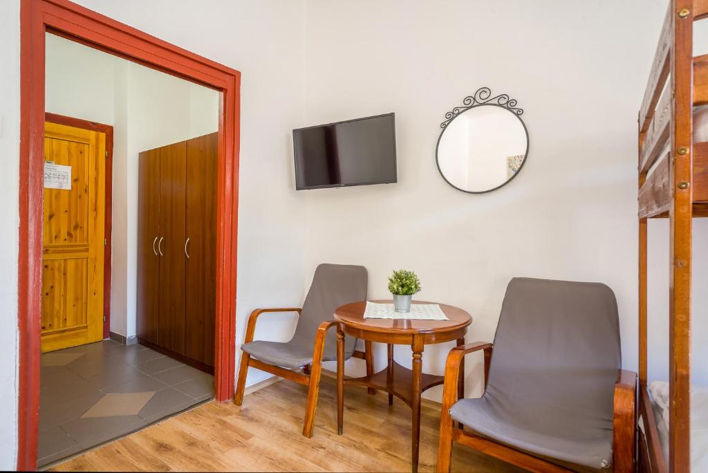 Posezení v ubytování Lipicai Hotel és Étterem
