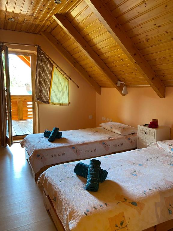 Posteľ alebo postele v izbe v ubytovaní Holiday home Tihovo