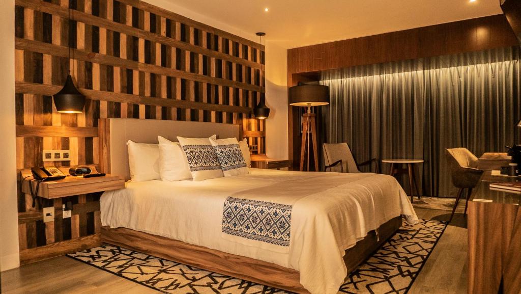 Postel nebo postele na pokoji v ubytování Hotel Indigo Guadalajara Expo by IHG