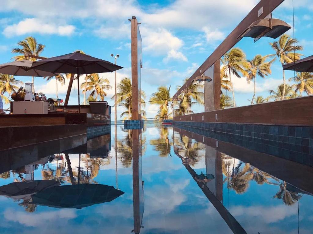 A piscina localizada em Netuanah Praia Hotel ou nos arredores