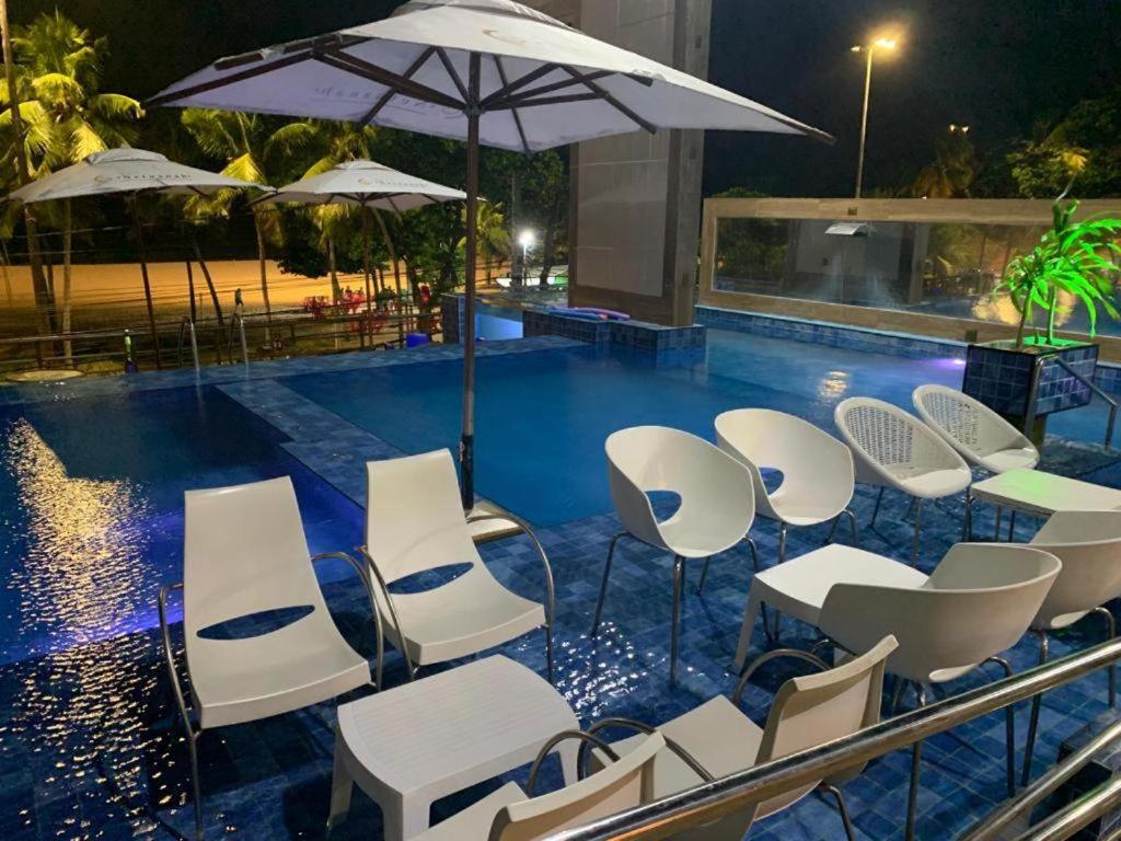 A piscina localizada em Netuanah Praia Hotel ou nos arredores