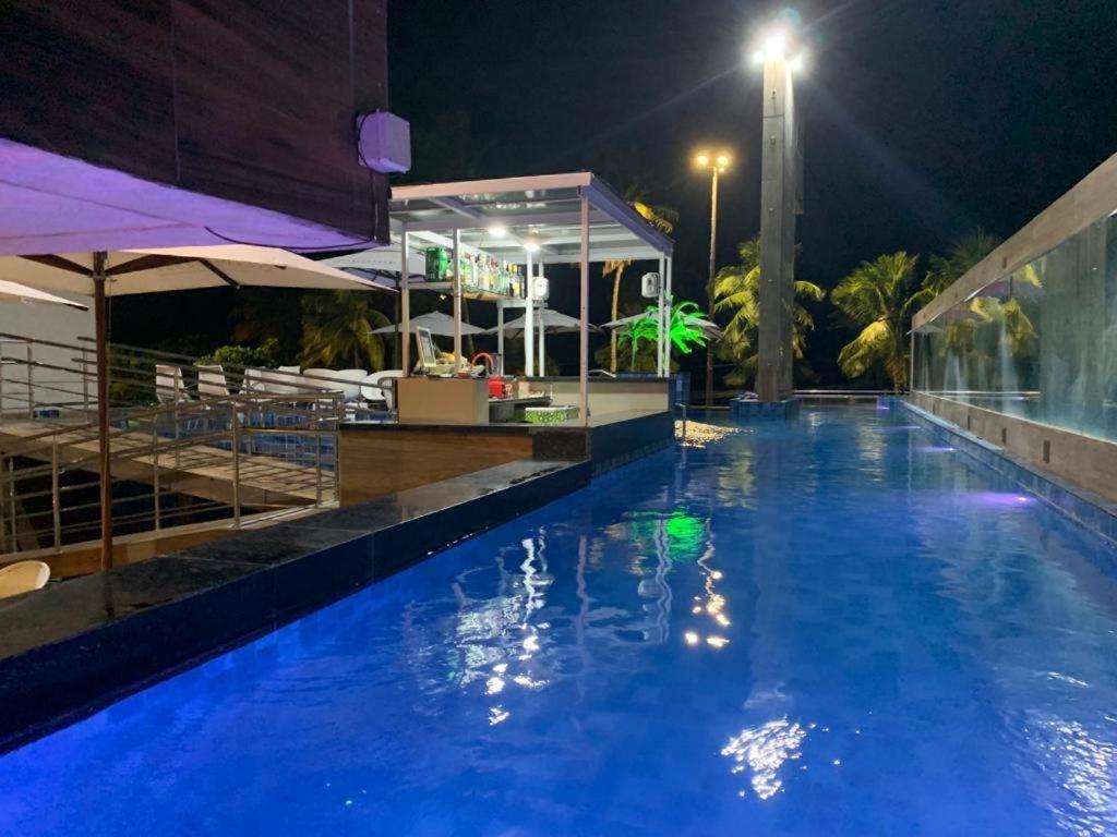 A piscina localizada em Netuanah Praia Hotel ou nos arredores