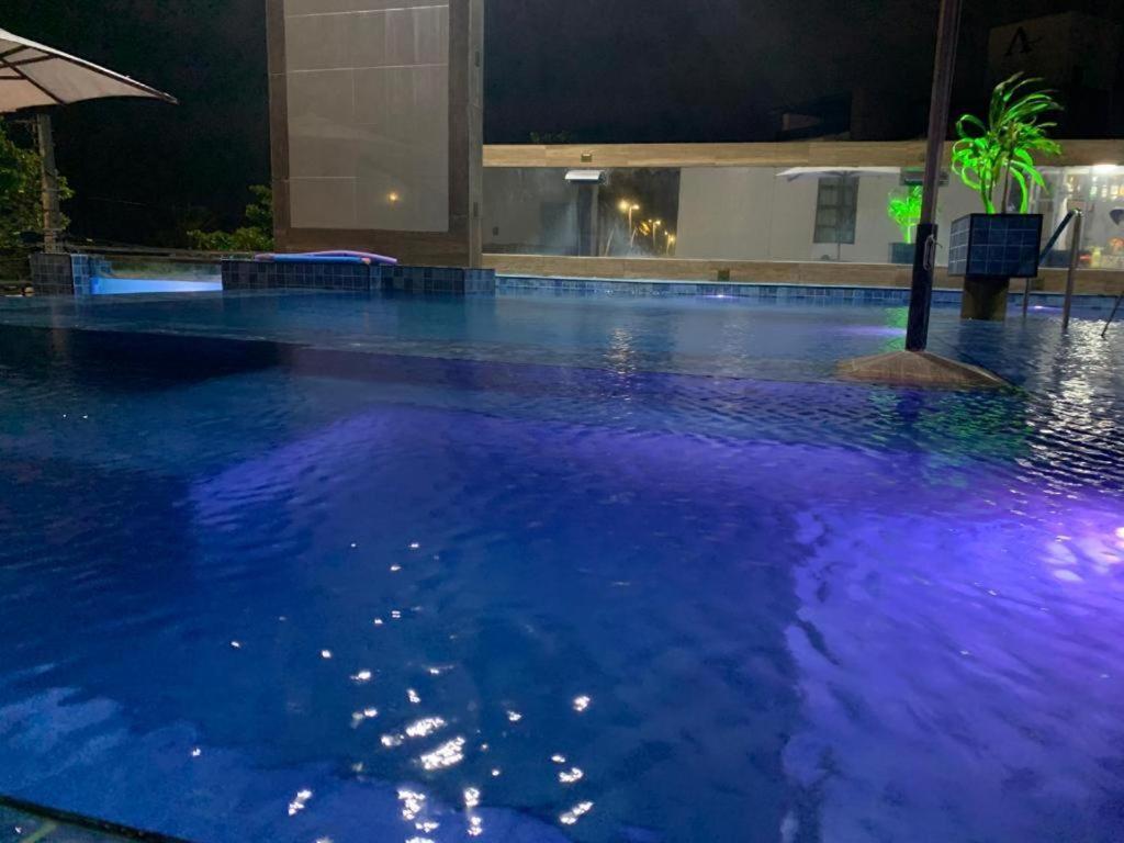 A piscina localizada em Netuanah Praia Hotel ou nos arredores