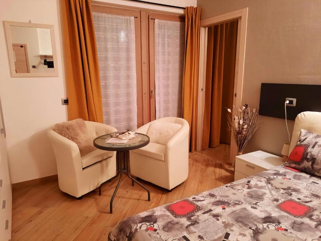 Postel nebo postele na pokoji v ubytování Il Vigneto