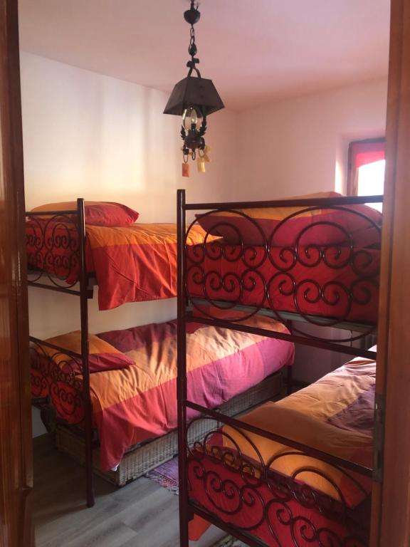Postel nebo postele na pokoji v ubytování Chalet Anna Chiara