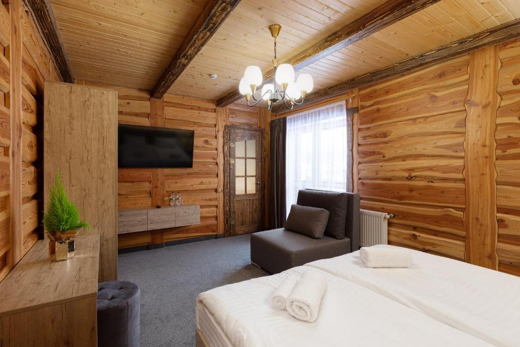 Postel nebo postele na pokoji v ubytování SVOI Hotel