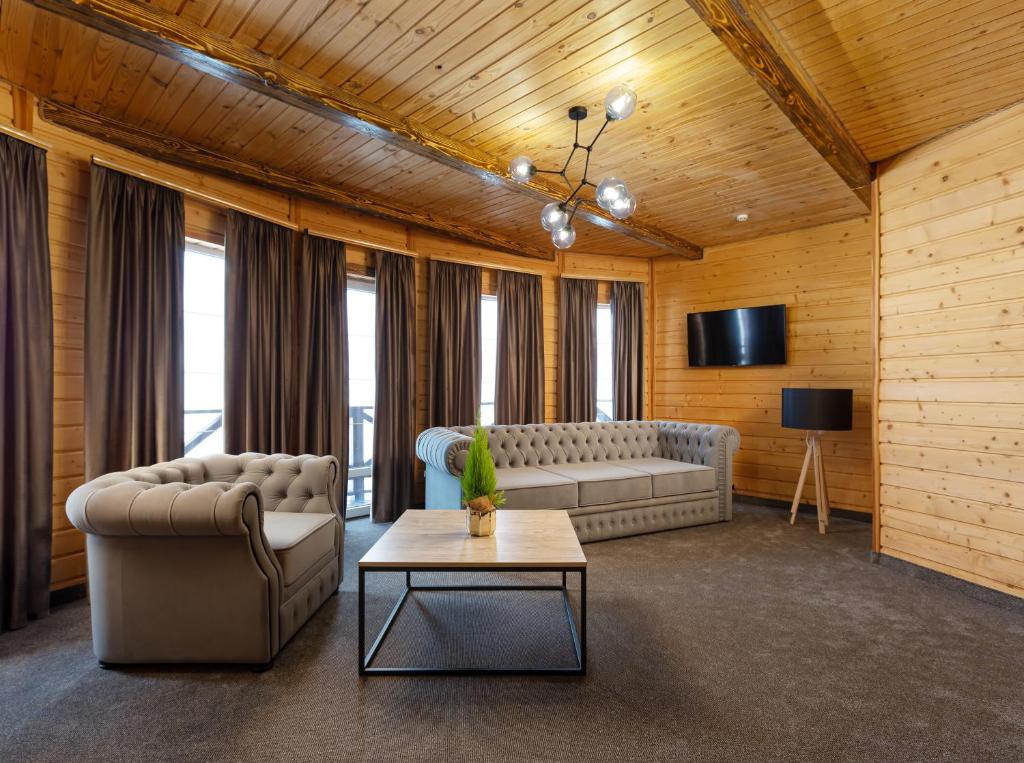 TV a/nebo společenská místnost v ubytování SVOI Hotel