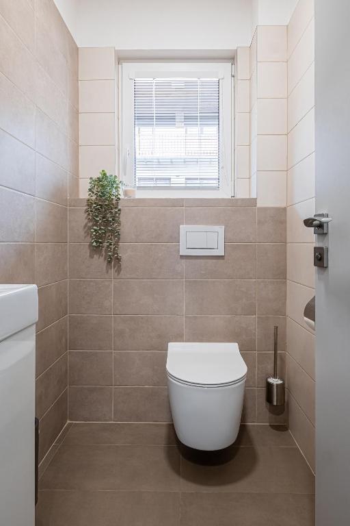 Koupelna v ubytování Apartmány ZaBukem